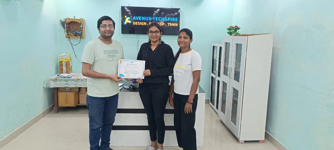Akash awarding a certificate to a student