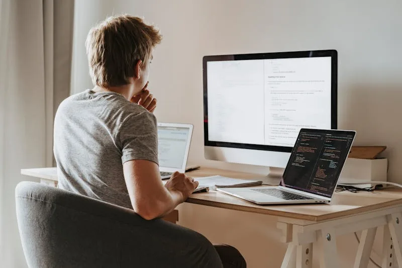 Designer reviewing a website layout on a tablet