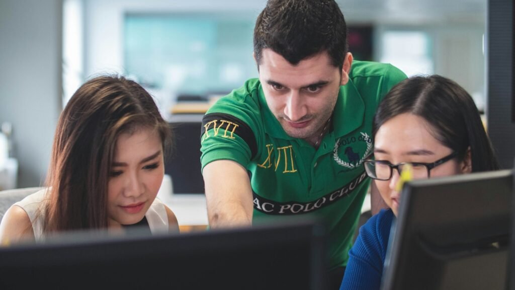 Students working together at a computer
